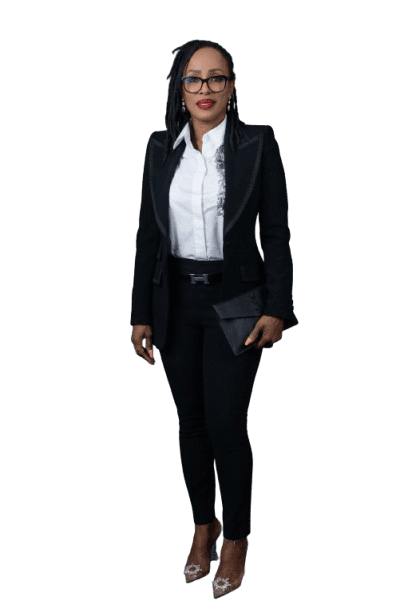 Diane Boyd, founder of Lioness Productions, in a full-length portrait — composed, confident presence against a deep backdrop.